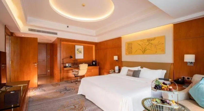 Bed in Fuyang International Trade Centre Hotel