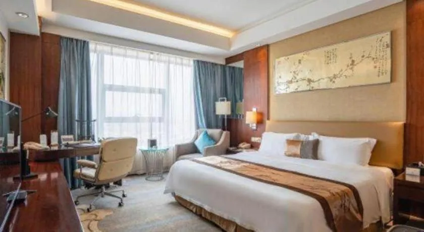 Bed in Fuyang International Trade Centre Hotel