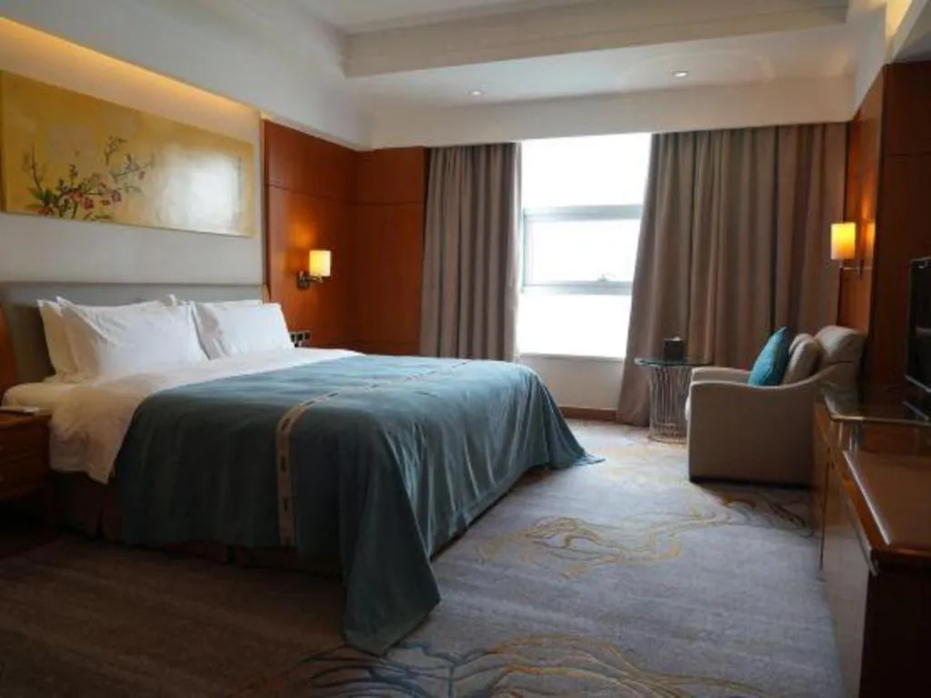 Bed in Fuyang International Trade Centre Hotel