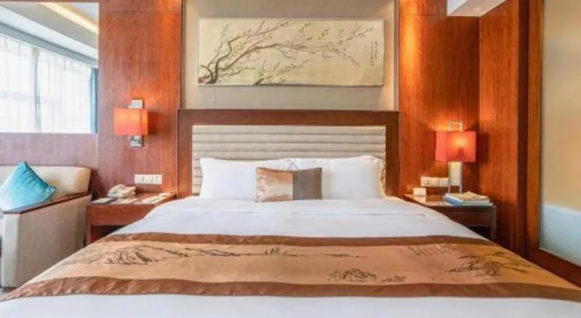 Bed in Fuyang International Trade Centre Hotel