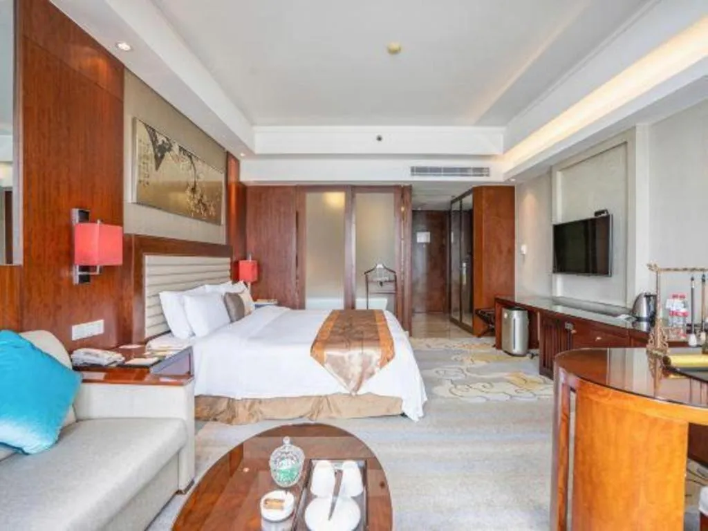 Bed in Fuyang International Trade Centre Hotel