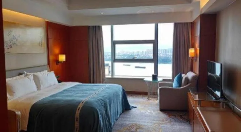 Bed in Fuyang International Trade Centre Hotel