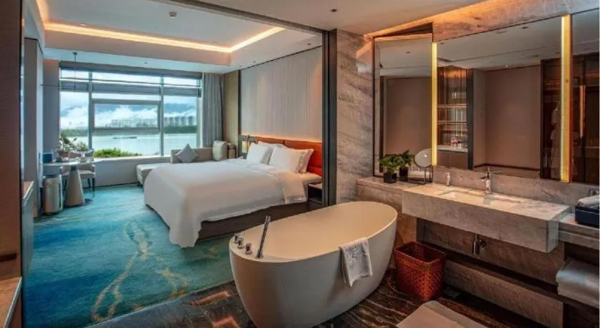 Bed in Fuyang International Trade Centre Hotel