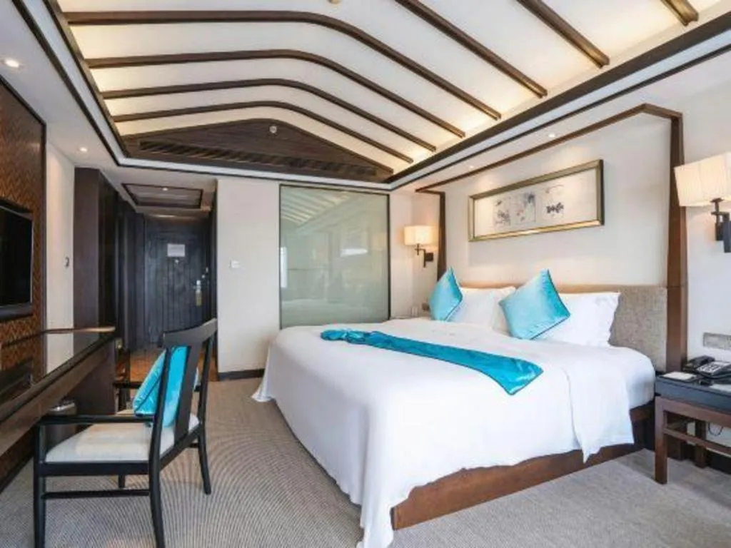 Bed in Fuyang International Trade Centre Hotel