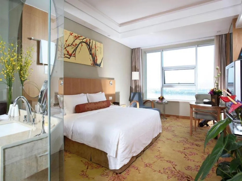 Bed in Fuyang International Trade Centre Hotel