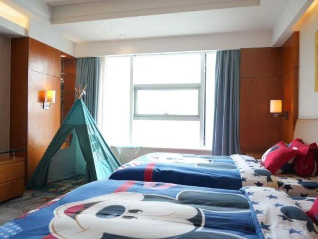 Bed in Fuyang International Trade Centre Hotel