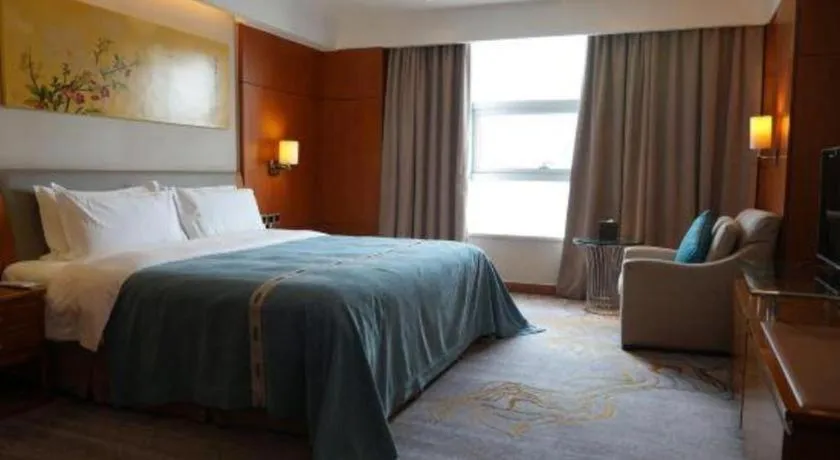 Bed in Fuyang International Trade Centre Hotel