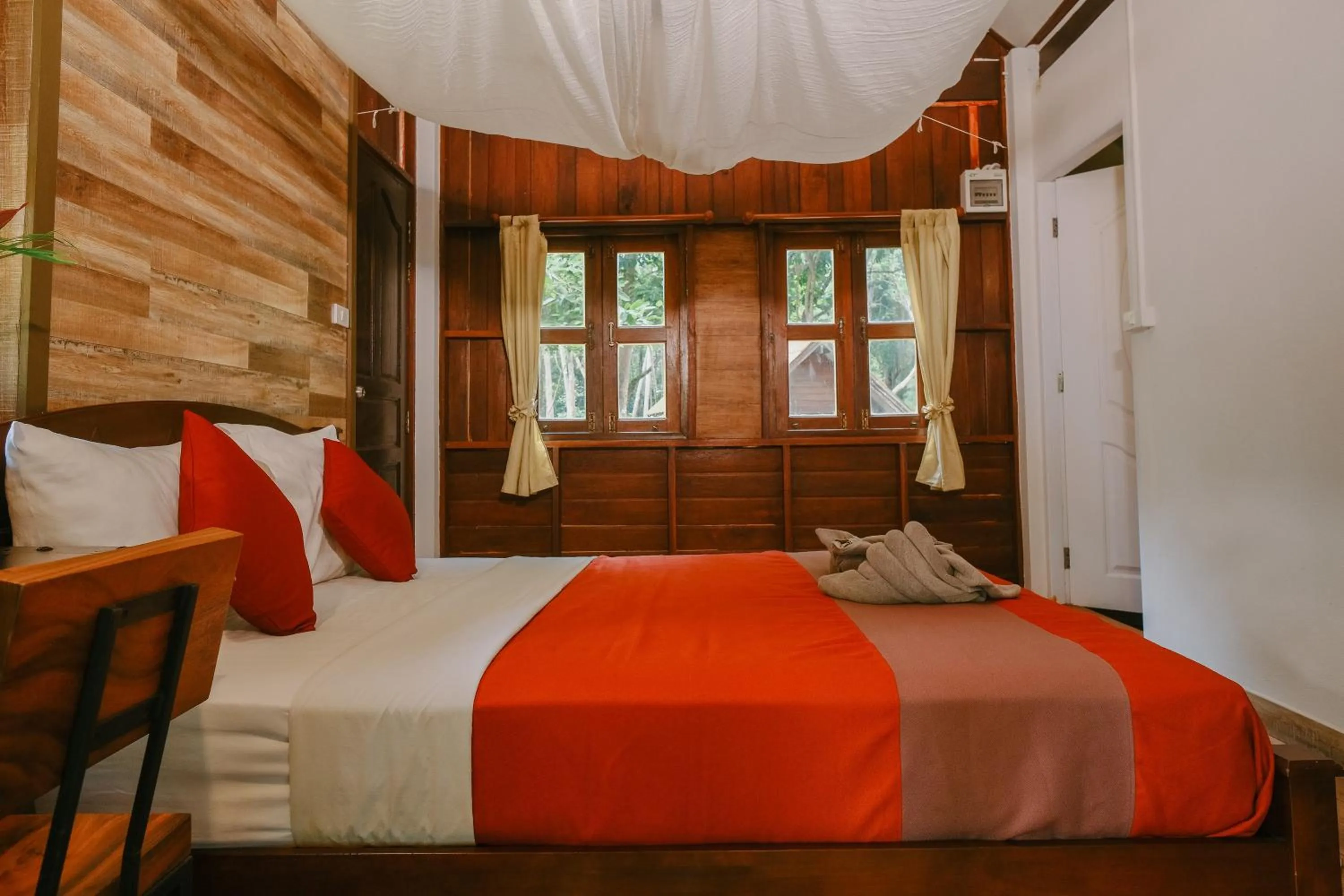 Bed in JOY Bungalow Resort and Restaurant