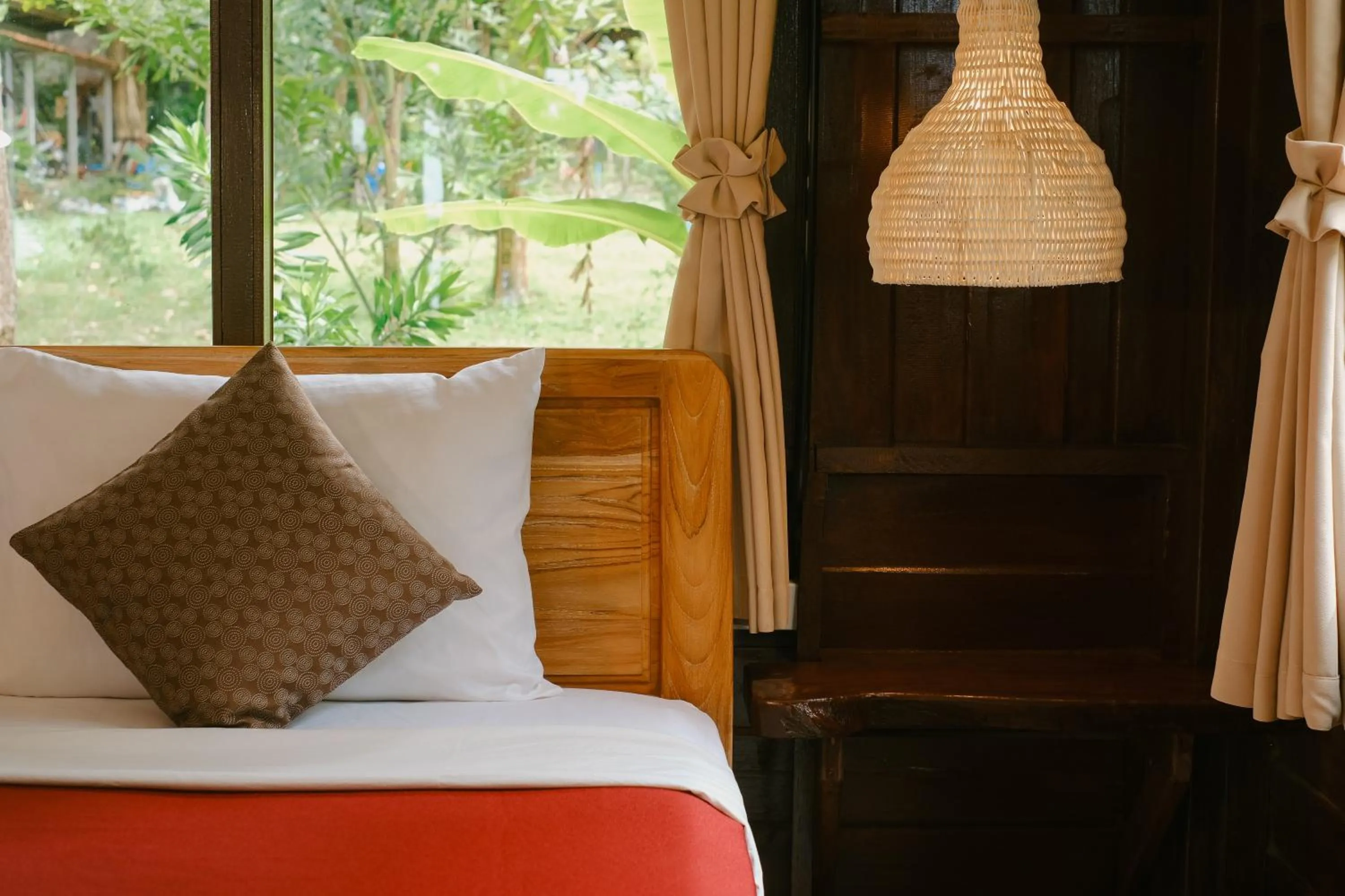 Bed in JOY Bungalow Resort and Restaurant