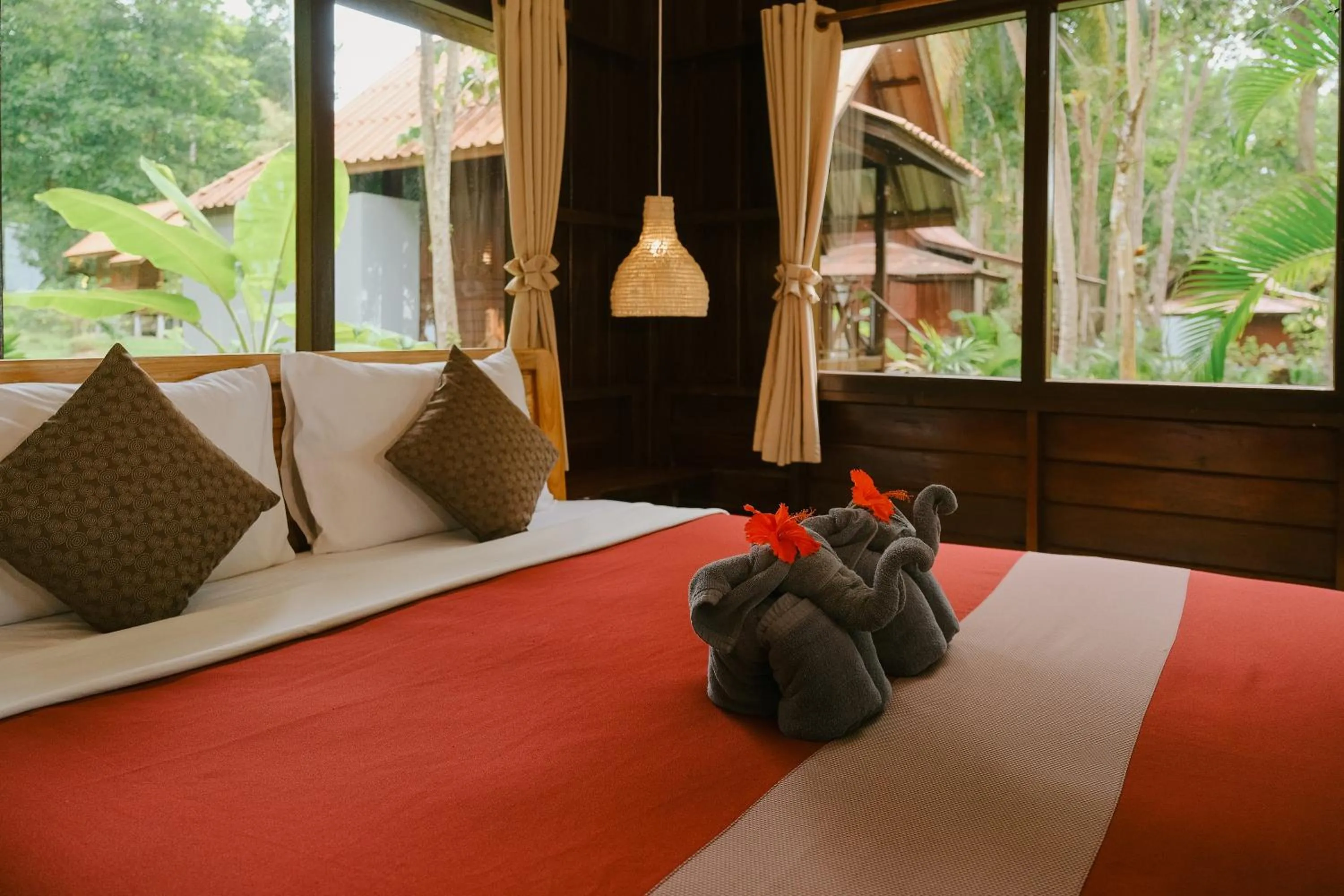 Bed in JOY Bungalow Resort and Restaurant