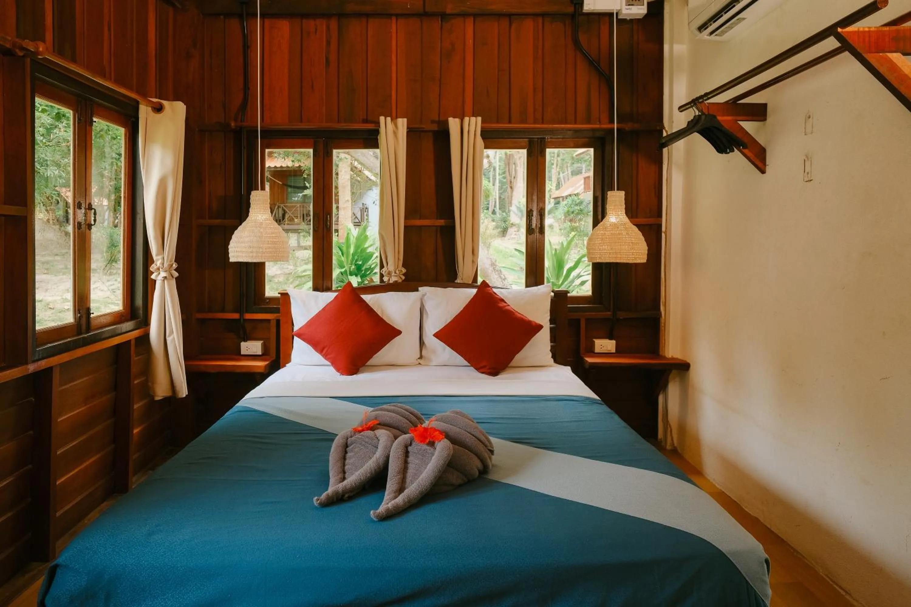 Bed in JOY Bungalow Resort and Restaurant
