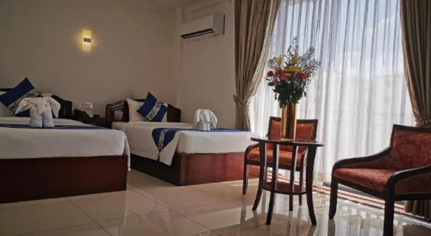 Bed in Jun Yue Hotel