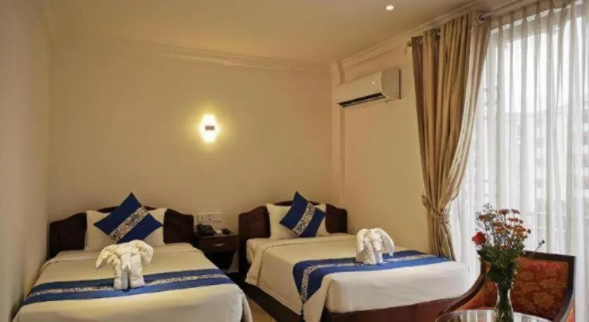 Bed in Jun Yue Hotel