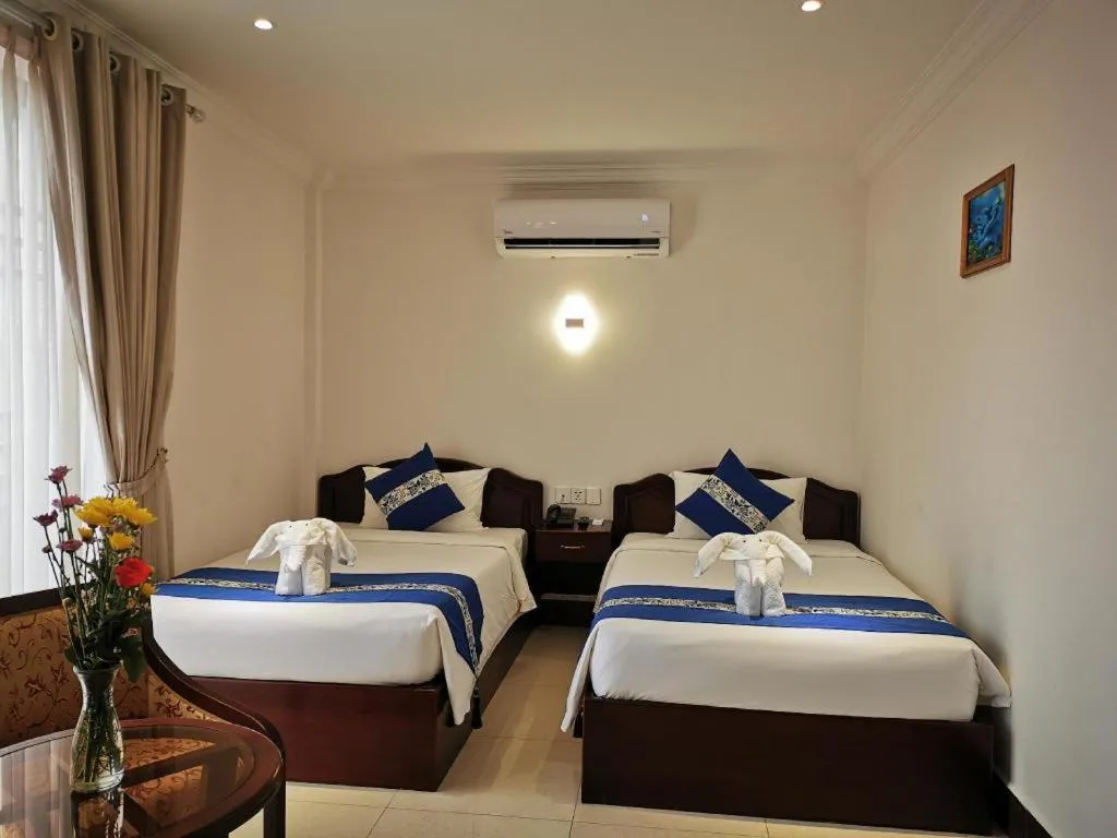 Bed in Jun Yue Hotel