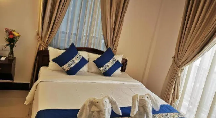 Bed in Jun Yue Hotel