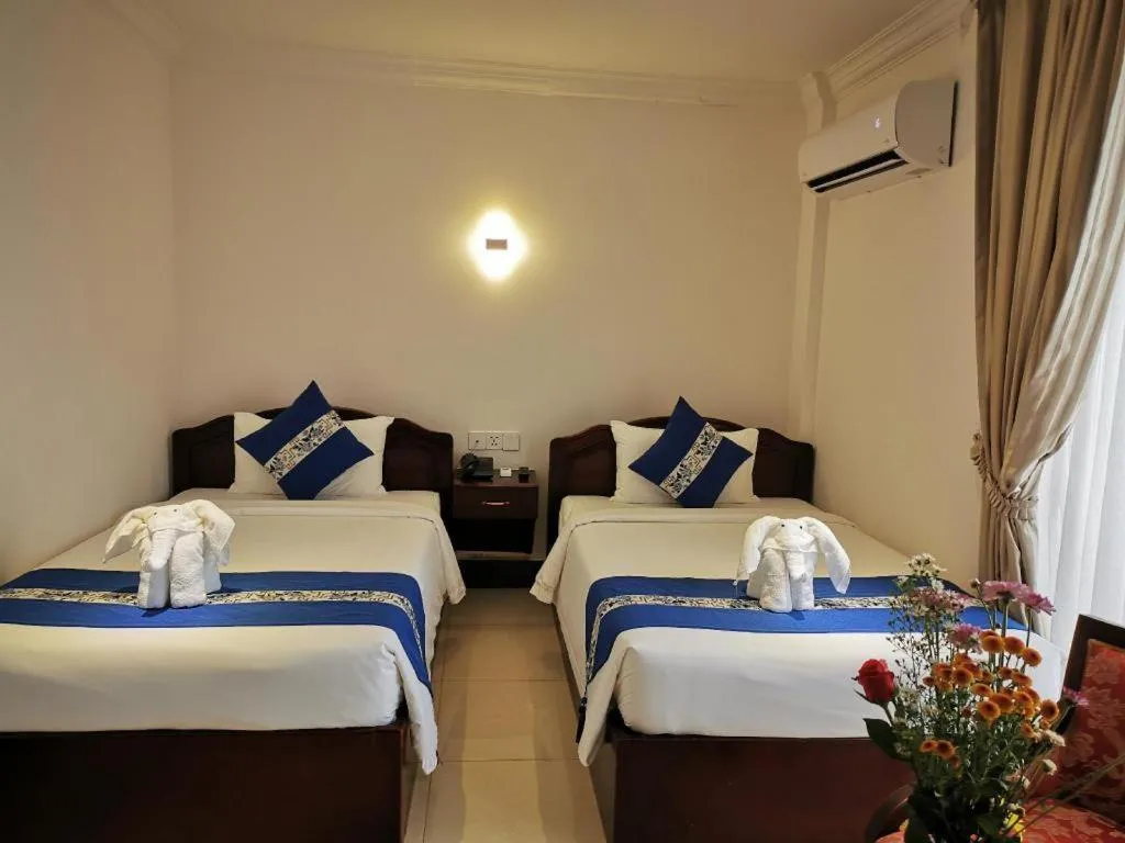 Bed in Jun Yue Hotel