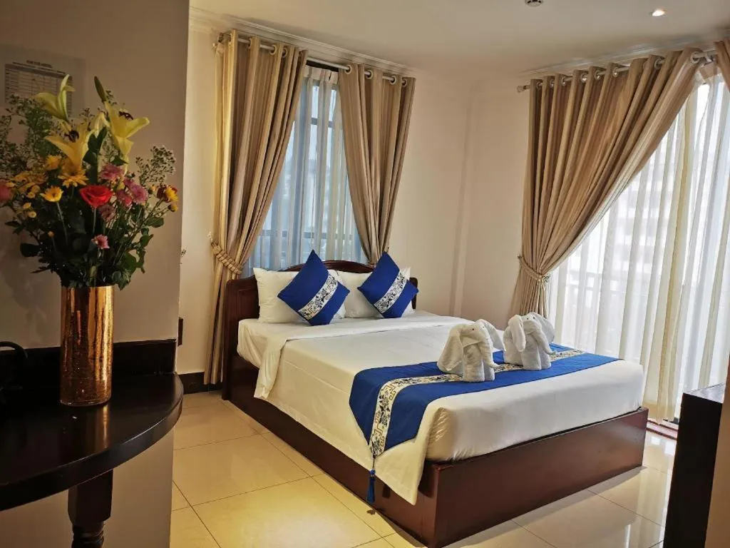 Bed in Jun Yue Hotel