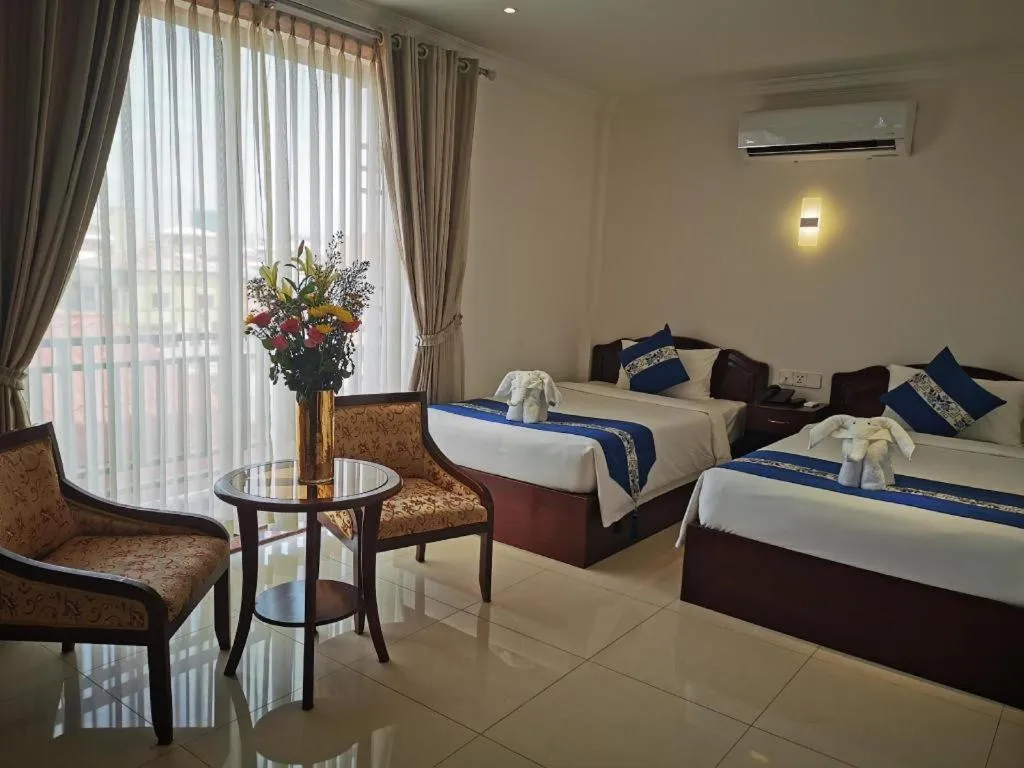 Bed in Jun Yue Hotel