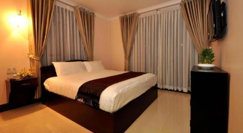 Bed in Jun Yue Hotel