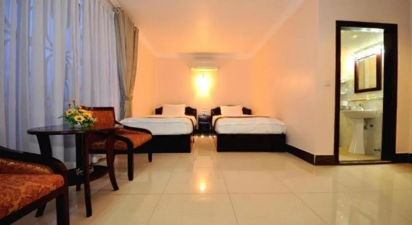 Bed in Jun Yue Hotel