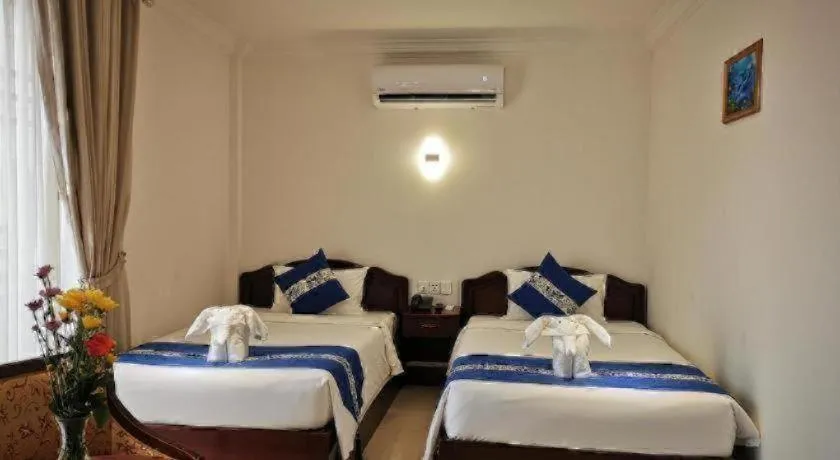 Bed in Jun Yue Hotel