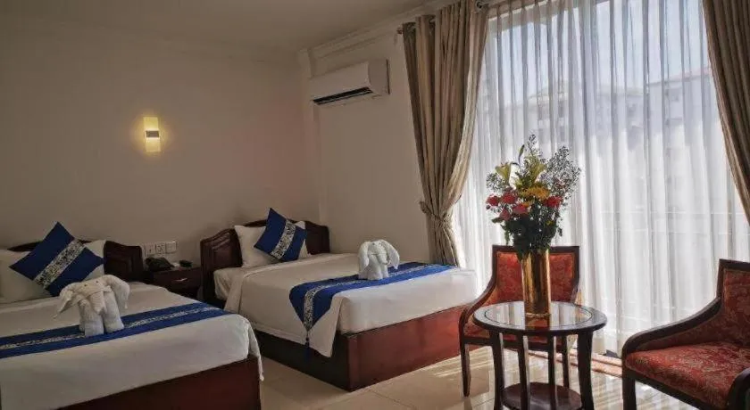 Bed in Jun Yue Hotel