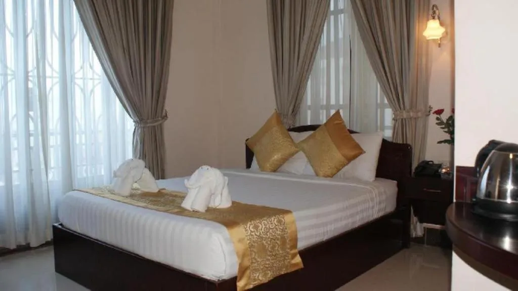 Bed in Jun Yue Hotel