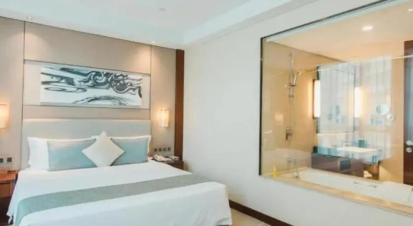 Bed in Grand Soluxe Zhongyou Hotel Shenzhen