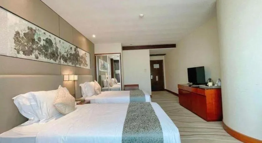 Bed in Grand Soluxe Zhongyou Hotel Shenzhen