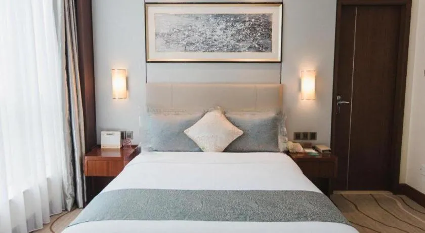 Bed in Grand Soluxe Zhongyou Hotel Shenzhen