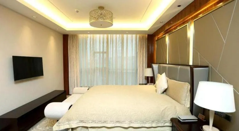 Bed in Grand Soluxe Zhongyou Hotel Shenzhen
