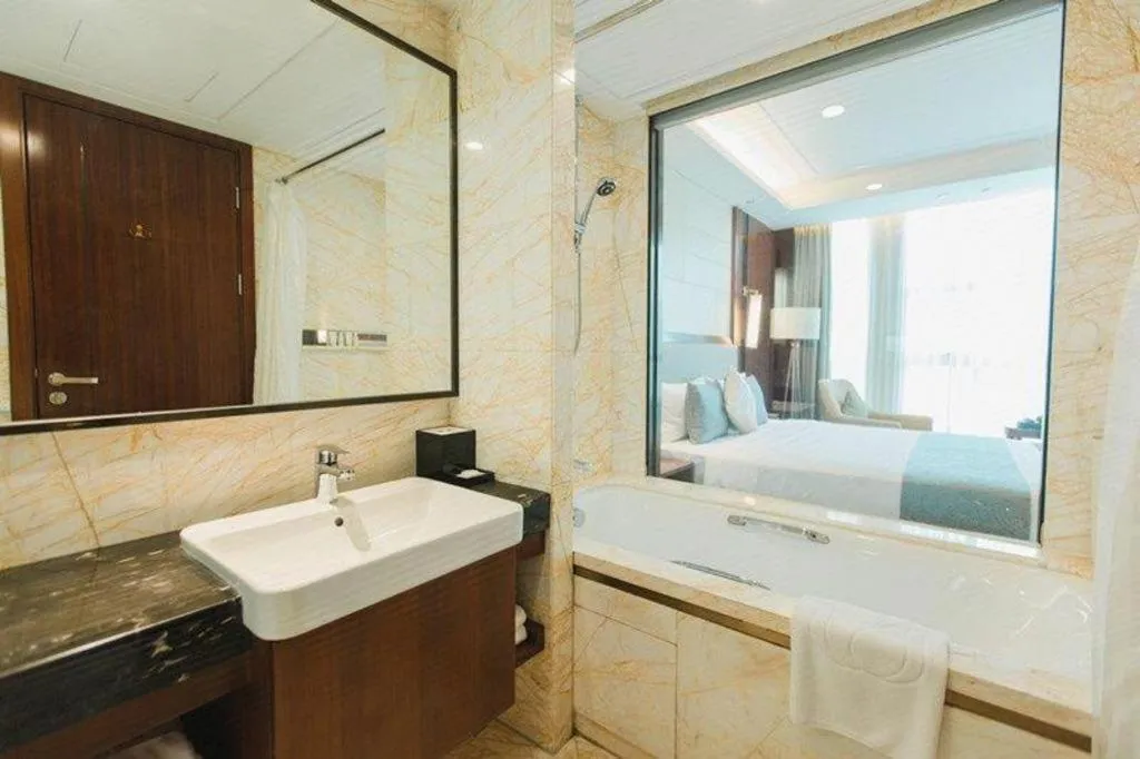 Bed in Grand Soluxe Zhongyou Hotel Shenzhen