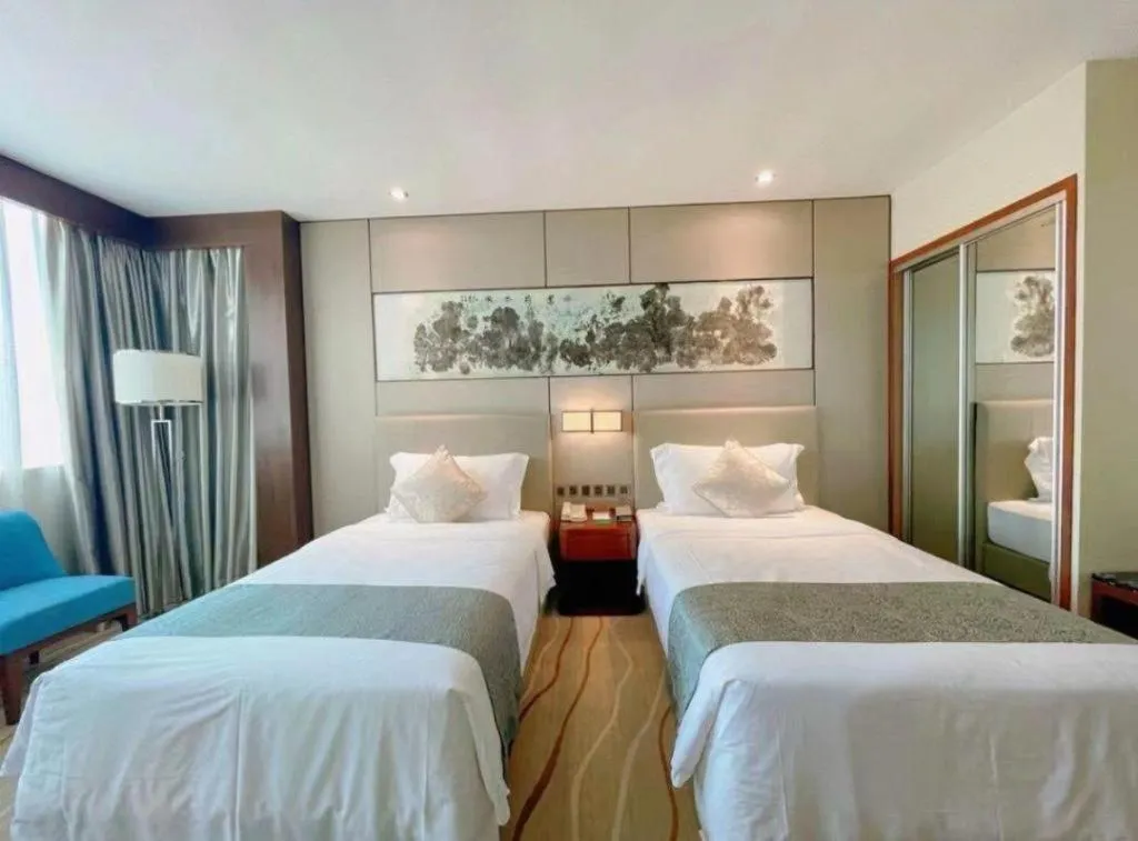 Bed in Grand Soluxe Zhongyou Hotel Shenzhen