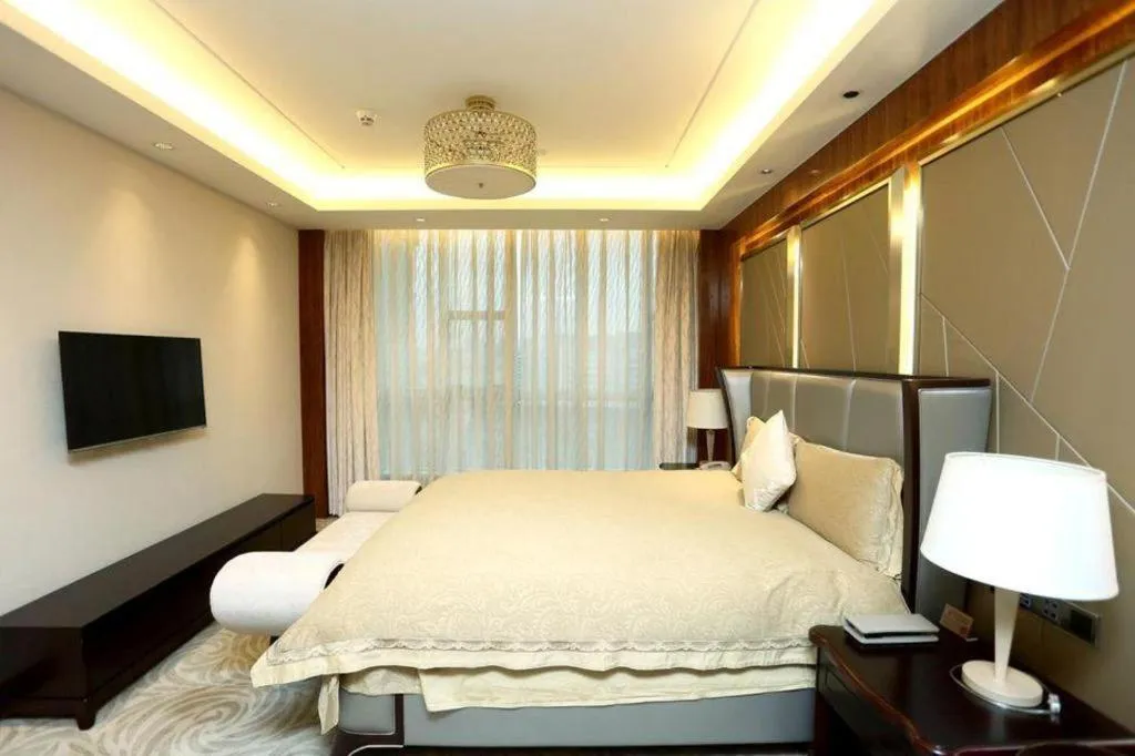 Bed in Grand Soluxe Zhongyou Hotel Shenzhen