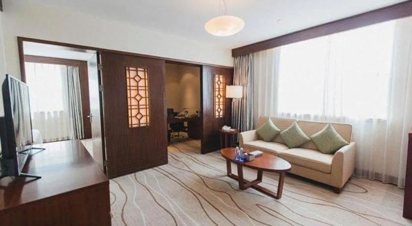 Bed in Grand Soluxe Zhongyou Hotel Shenzhen