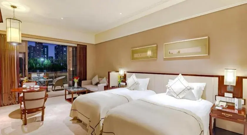 Bed in Tong Que Tai Jinling Hotel Tongling Anhui Bed in Tong Que Tai Jinling Hotel Tongling Anhui