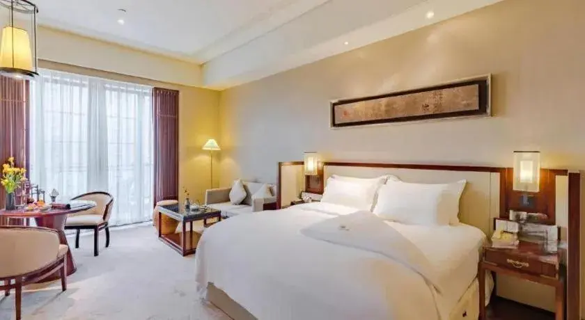Bed in Tong Que Tai Jinling Hotel Tongling Anhui Bed in Tong Que Tai Jinling Hotel Tongling Anhui