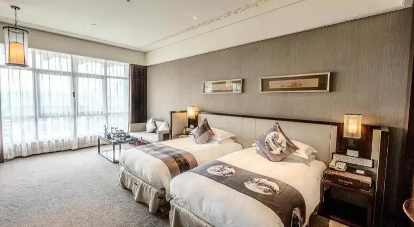 Bed in Tong Que Tai Jinling Hotel Tongling Anhui Bed in Tong Que Tai Jinling Hotel Tongling Anhui