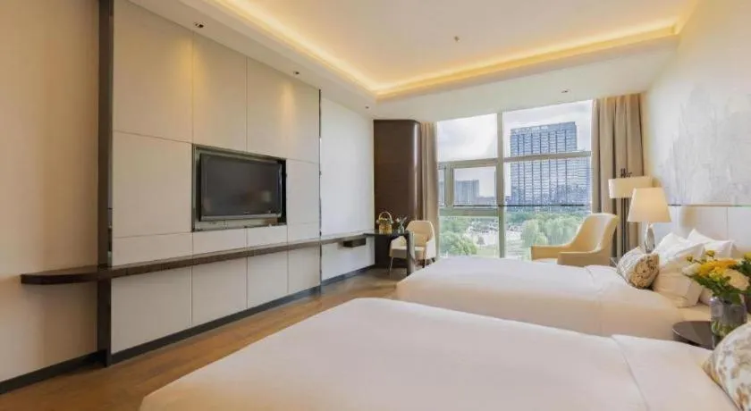 Bed in Nanjing Lakehome Hotels and Resorts