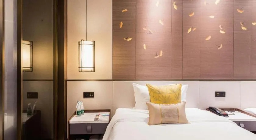 Bed in Nanjing Lakehome Hotels and Resorts