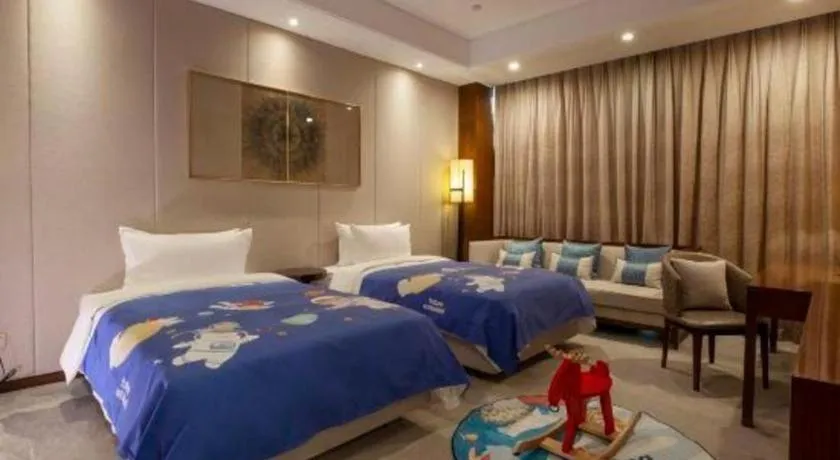 Bed in Nanjing Lakehome Hotels and Resorts
