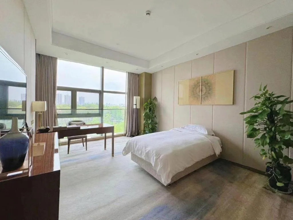 Bed in Nanjing Lakehome Hotels and Resorts