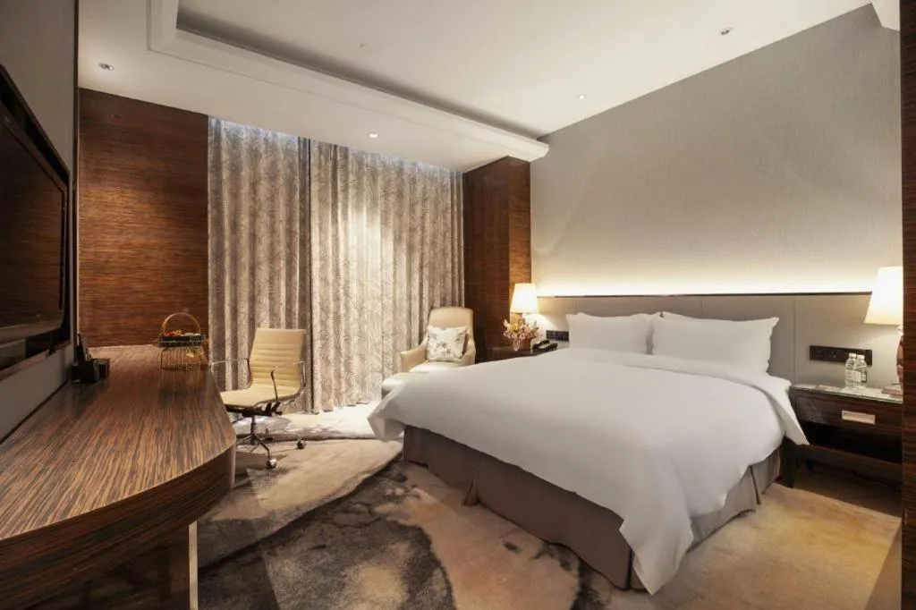 Bed in Nanjing Lakehome Hotels and Resorts