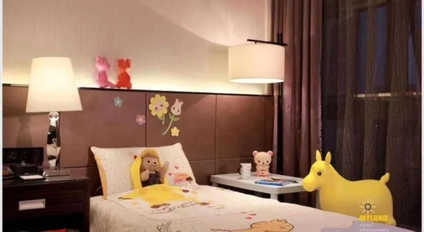 Bed in Nanjing Lakehome Hotels and Resorts