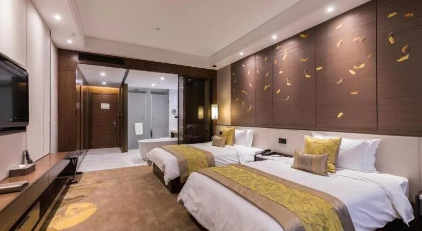 Bed in Nanjing Lakehome Hotels and Resorts