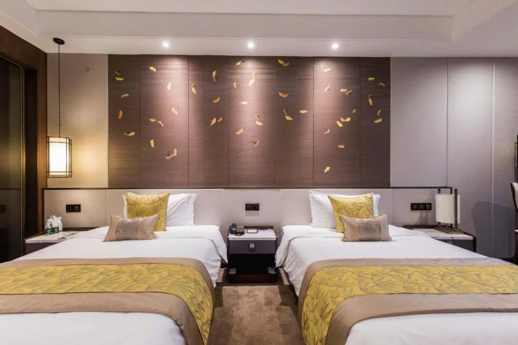 Bed in Nanjing Lakehome Hotels and Resorts