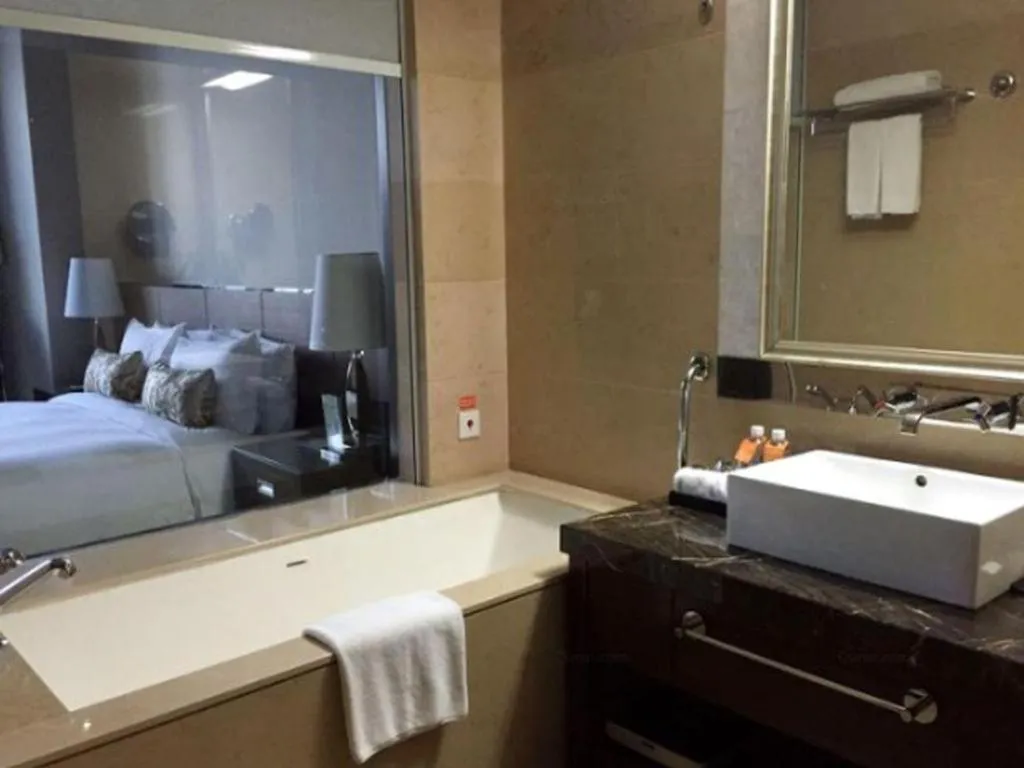 Bed in Nanjing Lakehome Hotels and Resorts