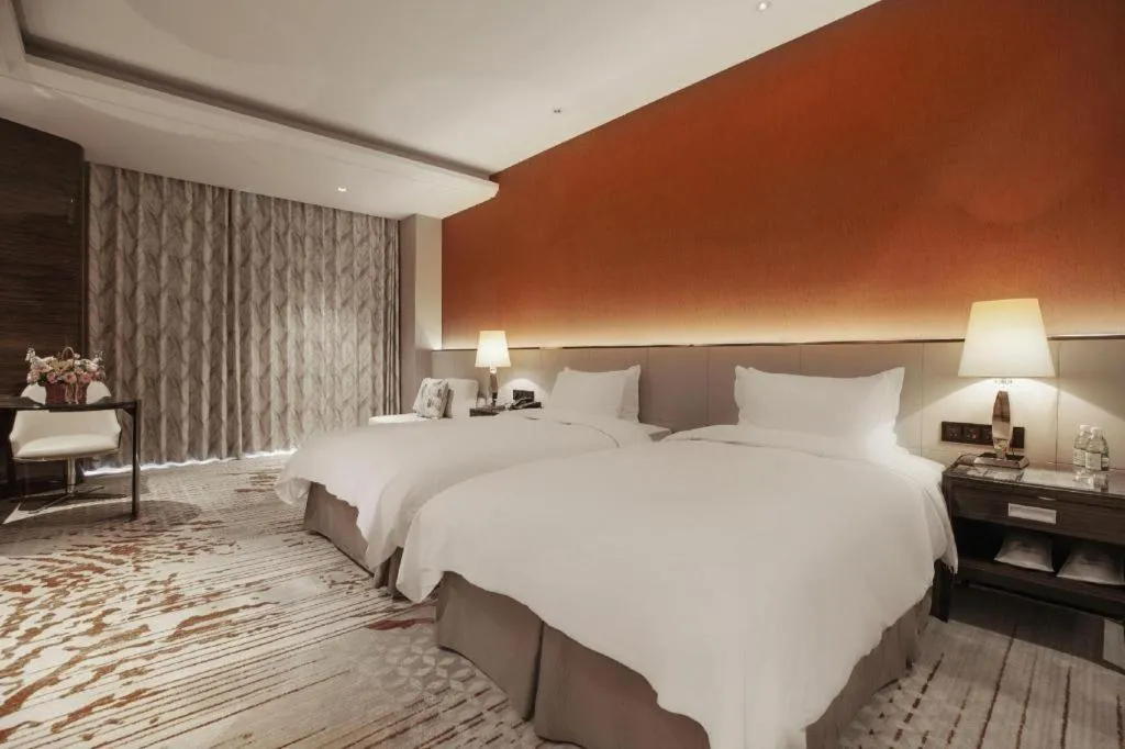 Bed in Nanjing Lakehome Hotels and Resorts