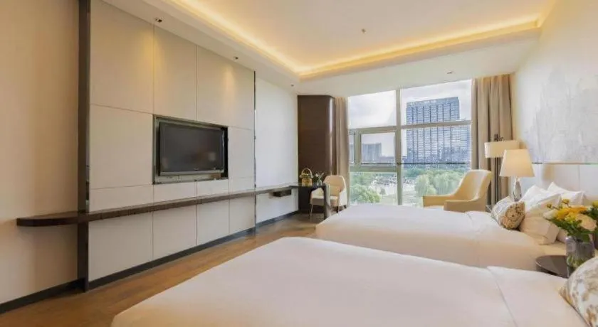 Bed in Nanjing Lakehome Hotels and Resorts
