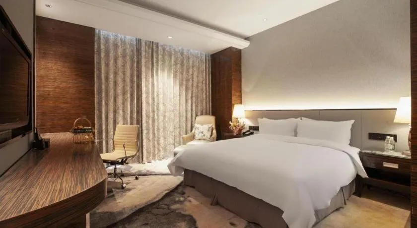 Bed in Nanjing Lakehome Hotels and Resorts